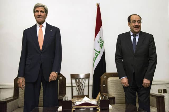 John Kerry meets with Iraqi prime minister Nouri al-Maliki. Picture: AP