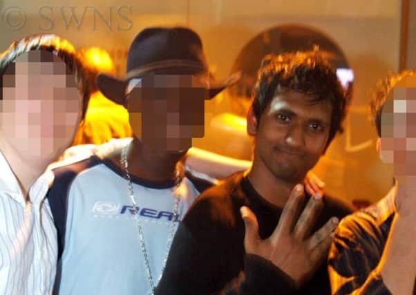 An undated photo of Abdul Raqib Amin, third right, on a night out with friends several years ago. Picture: Hemedia/SWNS