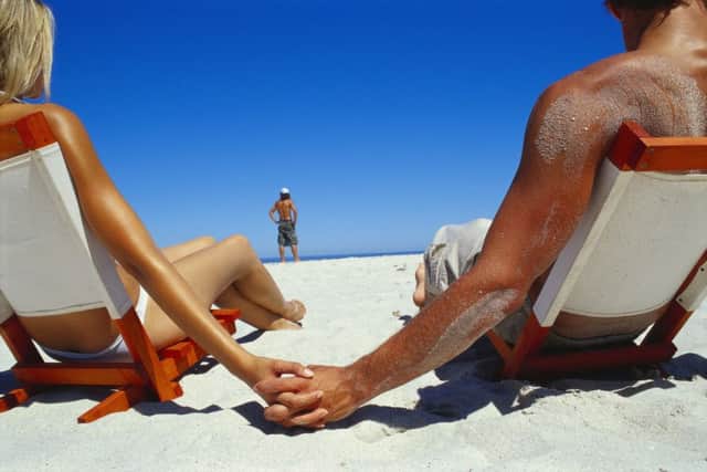 Suntans once indicated lower social status, but thats changed. Picture: Getty