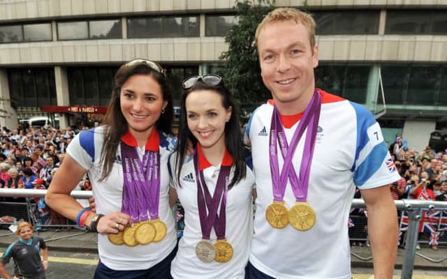 Sir Chris Hoy with Sarah Storey, far left and Victoria Pendleton at the victory parade for Team GB in 2012. Picture: Getty Images