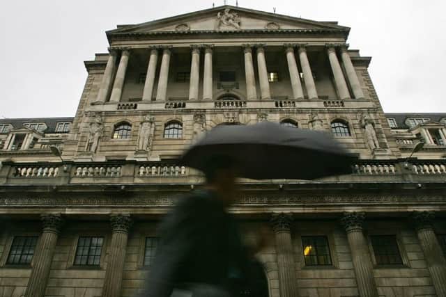 City workers pass the Bank of England. Picture: Getty