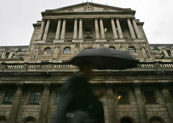City workers pass the Bank of England. Picture: Getty