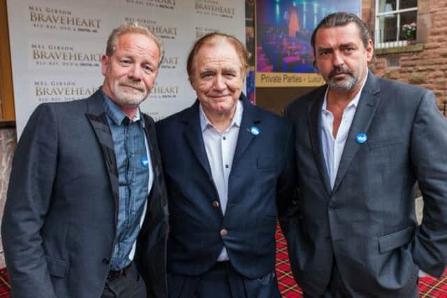 Brian Cox, centre, Peter Mullan, left, and Angus MacFadyen wear Yes badges at the Braveheart showing in Edinburgh last night