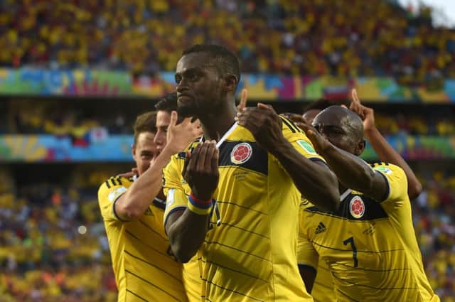 Colombia's forward Jackson Martinez celebrates with his temmates after scoring. Picture: Getty