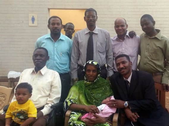 Mariam Yahya Ibrahim with her husband, family and lawyers. Picture: AFP/Getty