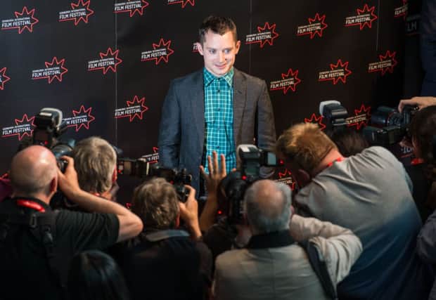 Elijah Wood is surrounded by photographers in Edinburgh earlier this week. Picture: Ian Georgeson