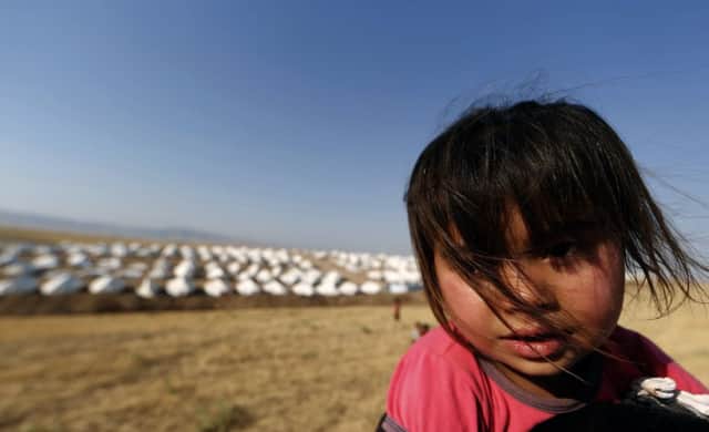 A child at a camp for displaced Iraqi Shiite Turkmen who fled their town of Tal Afar. Picture: Getty
