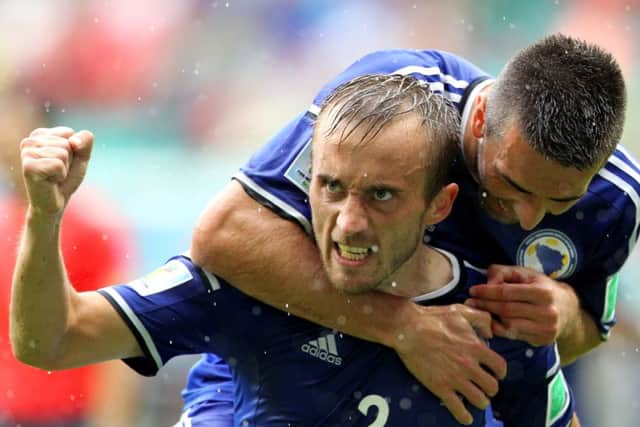Avdija Vrsajevic celebrates scoring Bosnia-Herzegovina's third goal against Iran. Picture: Getty