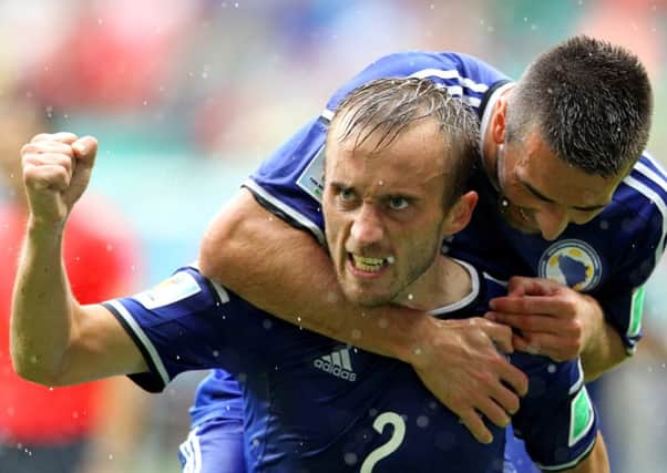 Avdija Vrsajevic celebrates scoring Bosnia-Herzegovina's third goal against Iran. Picture: Getty