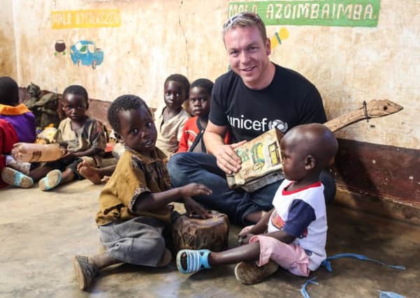 Sir Chris Hoy at the Children Centre in Taiza, Malawi. Picture: PA/Unicef