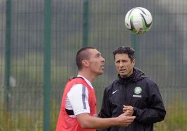 John Collins keeps an eye on Scott Brown during Celtic training at Lennoxtown. Picture: John Devlin