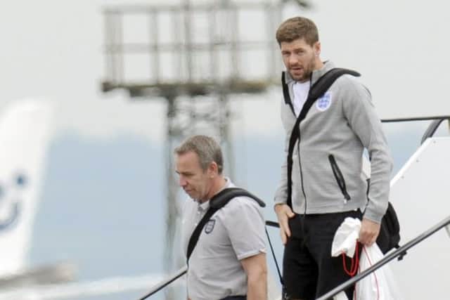 Steven Gerrard of England disembarks the plane as the England football team return home. Picture: Getty