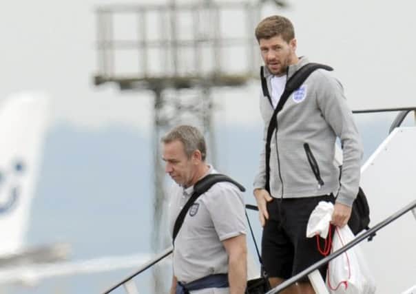 Steven Gerrard of England disembarks the plane as the England football team return home. Picture: Getty