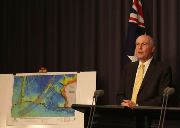 Transport minister Warren Truss talked about the new search area. Picture: Getty