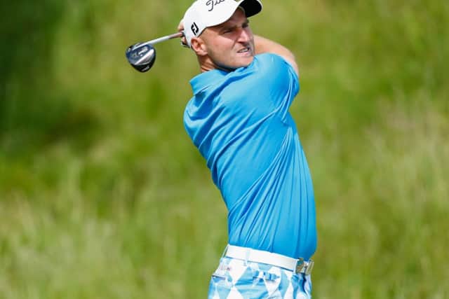 Wallace Booth tees off at the third during an opening round of 68 at Macdonald Spey Valley yesterday. Picture: Getty