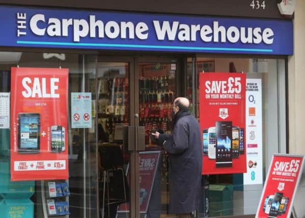 Dixons and Carphone Warehouse are to seal their £3.6bn merger in August. Picture: PA