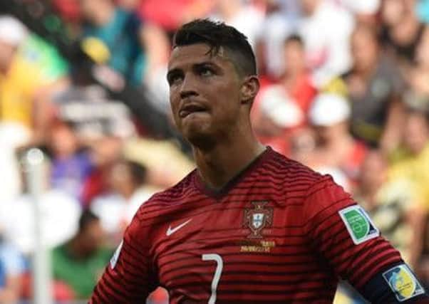 Portugal's forward and captain Cristiano Ronaldo is inconsolable after his side's World Cup exit. Picture: Getty