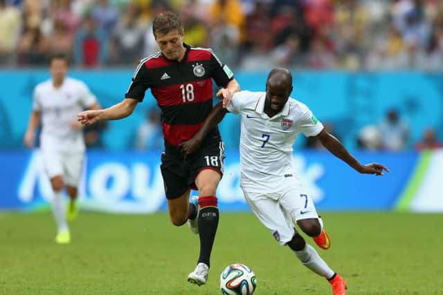 Toni Kroos of Germany fights off DaMarcus Beasley of the United States. Picture: Getty