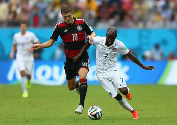 Toni Kroos of Germany fights off DaMarcus Beasley of the United States. Picture: Getty