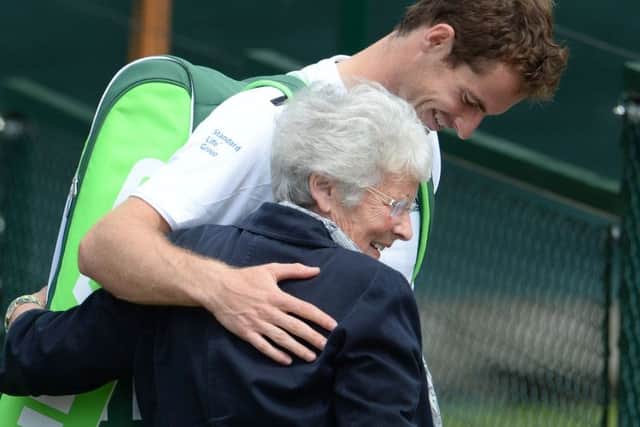 Andy Murray hugs his granmother Shirley Erskine after finishing his practice session at Wimbledon yesterday morning. Picture: Ian Rutherford