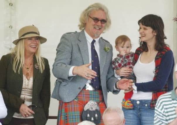 Comedian Billy Connolly attending the Lonach Highland Games in Aberdeenshire with his family. Picture: PA