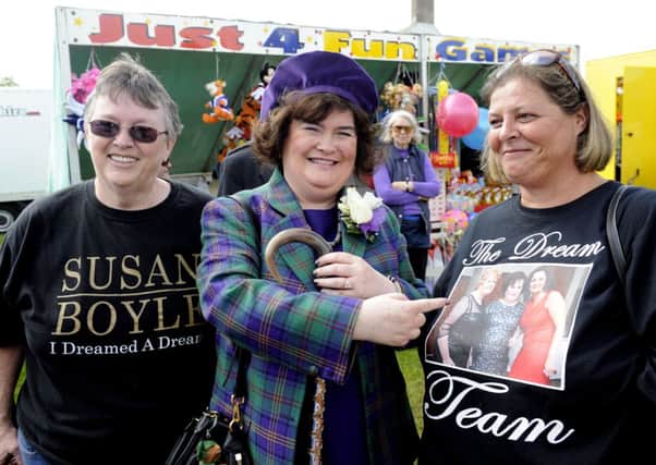 Susan Boyle with a couple of fans from the States, Sandy Rowden and Candy Melton. Picture: TSPL