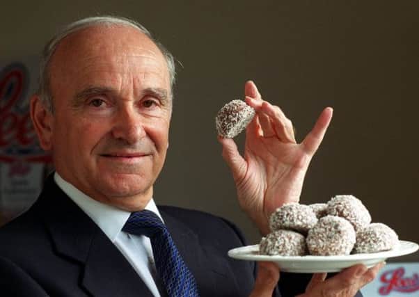 Raymond Miquel, former chairman and chief executive of Lee's, with a plate of snowballs (which are definitely cakes). Picture: TSPL