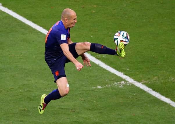 Arjen Robben controls the ball before scoring the Netherlands second goal against Spain. Picture: Getty