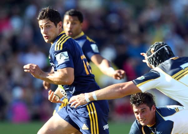 Phil Burleigh tries to burst through the Brumbies defence while playing for Highlanders. Picture: Getty