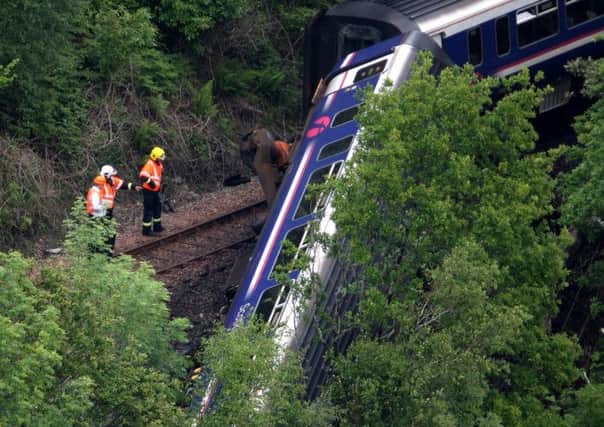 A train derailed near the Falls of Cruachan power station after hitting a boulder. Picture: PA