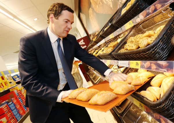 George Osborne visited a Lidl store on the same day as the Tesco AGM. Picture: Rex