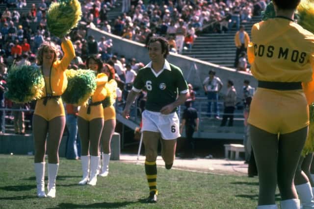Germanys legendary captain Franz Beckenbauer runs out between the New York Cosmos. Picture: Tony Duffy