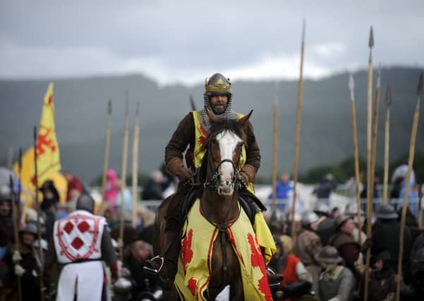 Actors take part in a re-enactment to commemorate the 700th anniversary of the Battle Of Bannockburn. Picture: Getty