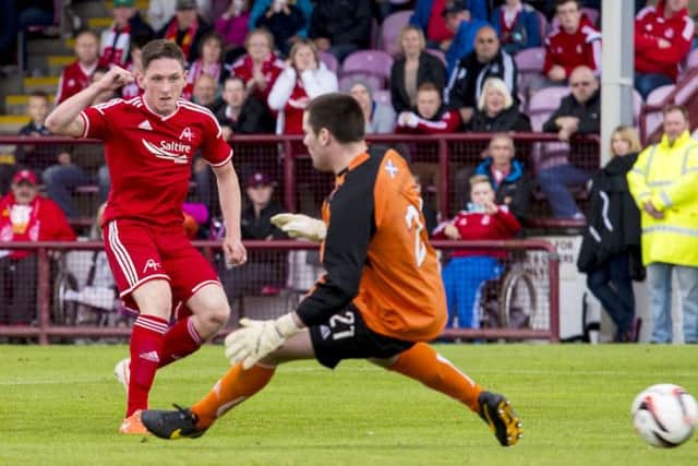 Aberdeen's Declan McManus scores the Dons' 7th goal. Picture: SNS