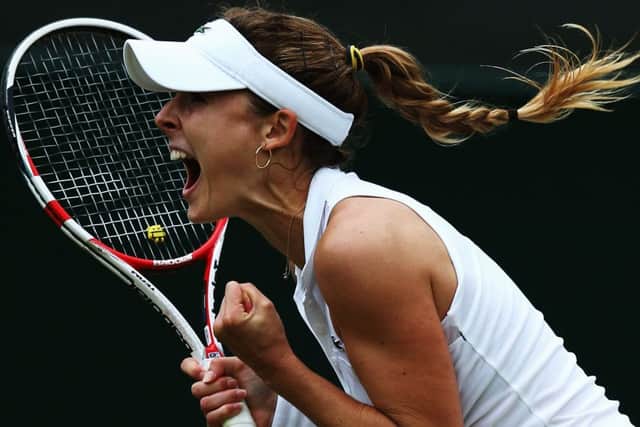 Alize Cornet celebrates her sensational victory against top seed Serena Williams. Picture: Getty Images