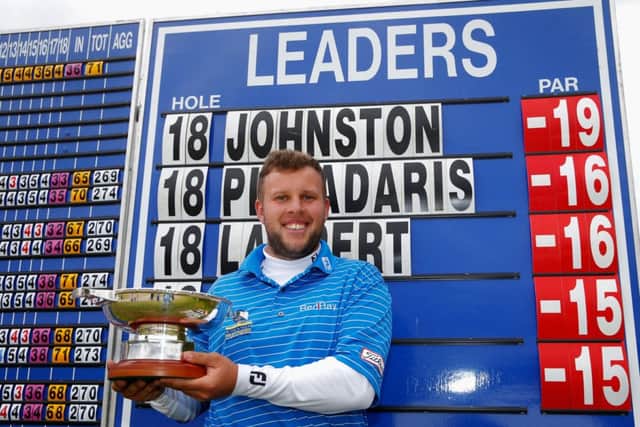 Andrew Johnston, who missed five months of last season with a shoulder injury, shows off the trophy. Picture: Getty