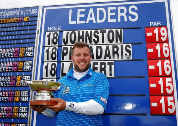 Andrew Johnston, who missed five months of last season with a shoulder injury, shows off the trophy. Picture: Getty