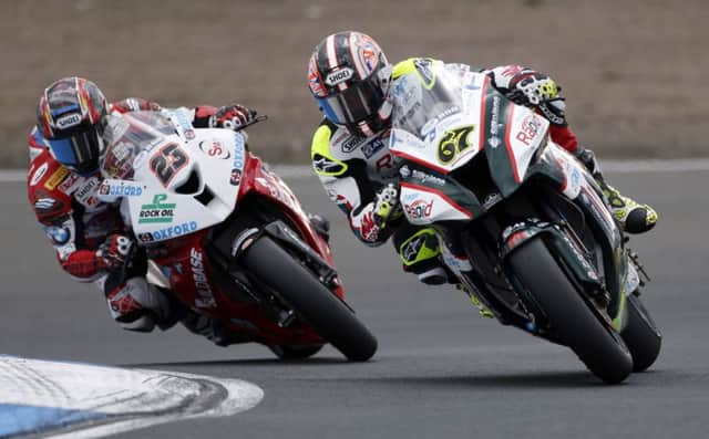 Race winner Shane Byrne, right, and Ryuichi Kiyonari were close to each other throughout their races. Picture: PA