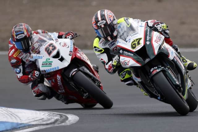 Race winner Shane Byrne, right, and Ryuichi Kiyonari were close to each other throughout their races. Picture: PA