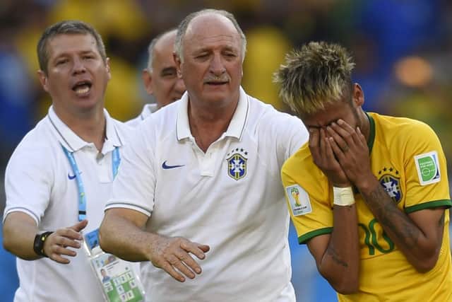 The cracks are beginning to show for Neymar and Scolari after the pressure of the penalty shoot-out. Picture:AFP/Getty