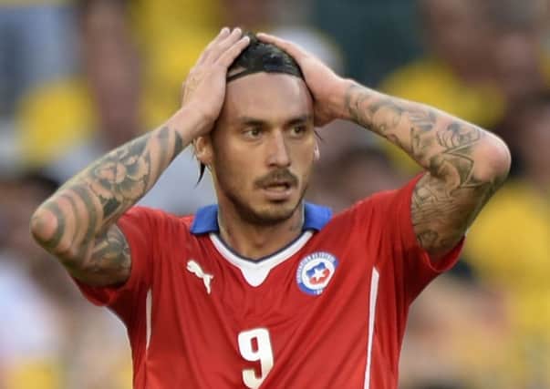 Mauricio Pinilla reacts after missing a chance against Brazil. Picture: Getty