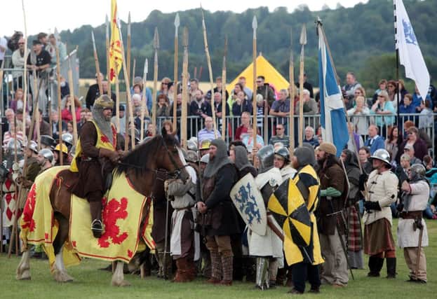 Huge queues formed to see the battle re-enactment but some ticket holders were turned away. Picture: SWNS