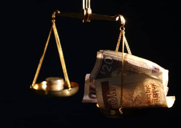 A report has said that an independent Scotland faces a budget shortfall of four billion pounds in 2016 - but the UK government faces a shortfall of 11 billion pounds. Picture: TSPL