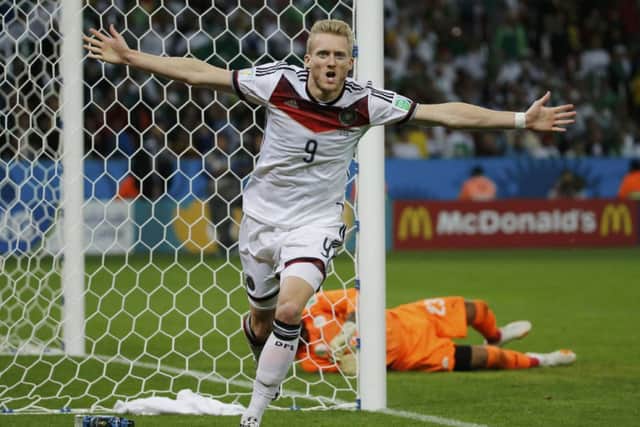 Germanys Andre Schurrle wheels away in celebration after breaking the deadlock in extra time. Picture: Reuters