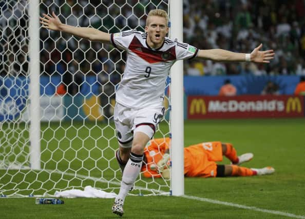 Germanys Andre Schurrle wheels away in celebration after breaking the deadlock in extra time. Picture: Reuters