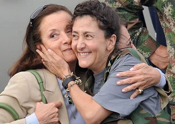 On this day in 2008, Farc hostage Ingrid Betancourt, pictured above with her mother, was rescued by Colombian armed forces. Picture: Getty