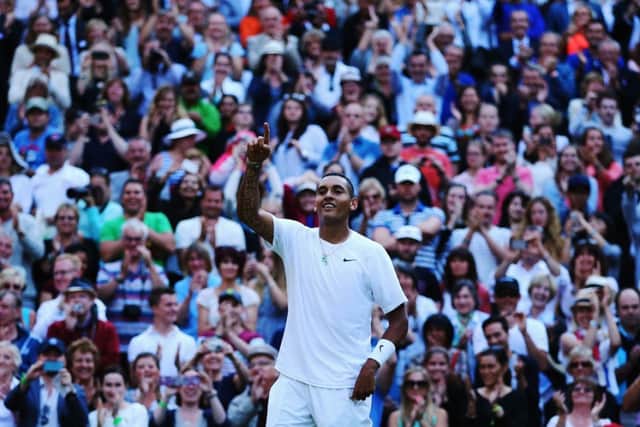 Nick Kyrgios of Australia celebrates match point and winning his match against Rafael Nadal. Picture: Getty