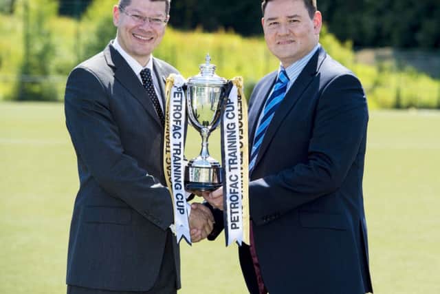 Neil Doncaster (left) joins Petrofac's Laurence Milne to announce the new sponsor. Picture: SNS