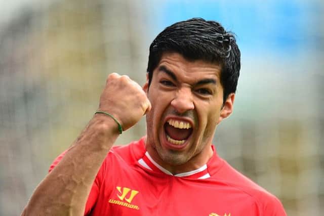 Luis Suarez: Barcelona-bound? Picture: PA