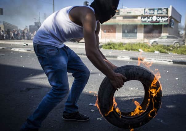 Palestinian youths clash with Israeli police in Jerusalem. Picture: Getty